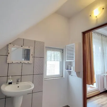Quarto em Acomodações Particulares Goscinne U Zosi